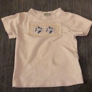 White and blue airplane smocked toddler top